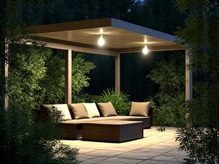Soft downlighting from a high mounted fixture creating moonlighting effect on a patio